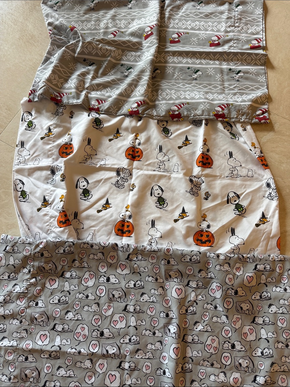 Three snoopy sheet sets